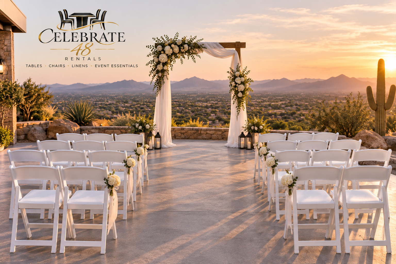White padded chairs at a desert wedding overlooking Arizona mountains
